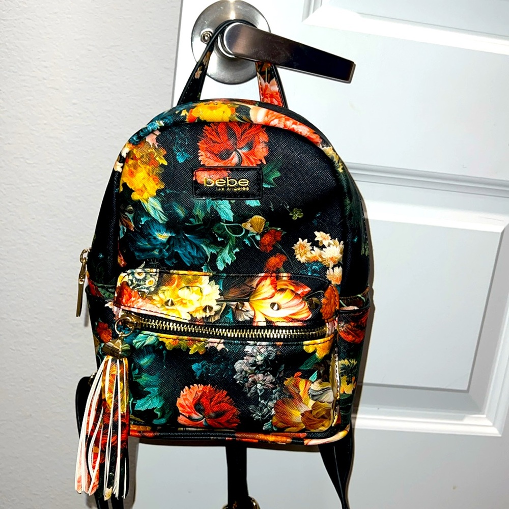 Bebe backpack flower print purse.